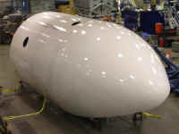 2008 Falcon9 fairing-half.jpg (82783 octets)